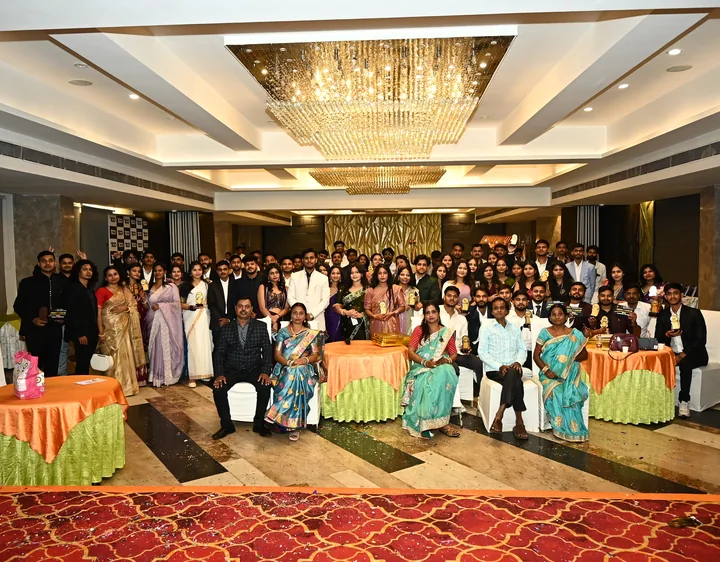 Roshan Burnwal and The Drop Organization team together at an event.