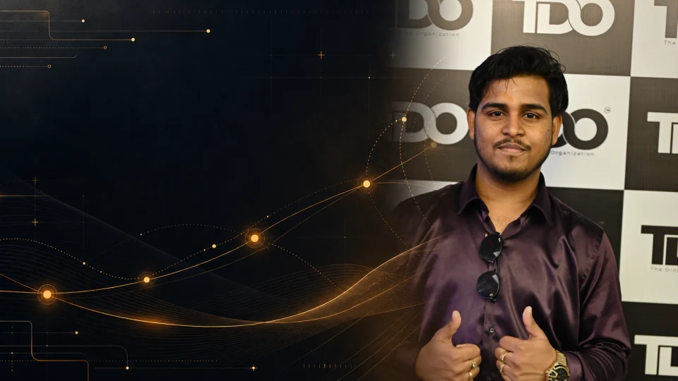 Original photograph of Roshan Burnwal in front of The Drop Organization backdrop, blended with a bronze cybersecurity roadmap graphic.